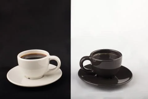 Black and white cups of coffee concept Stock Photos