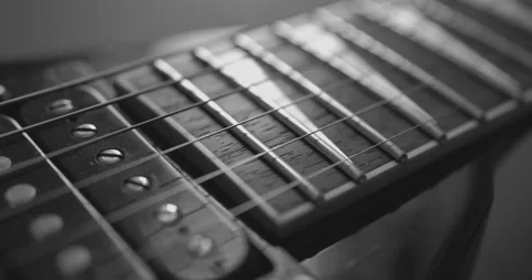 Black and white dolly shot of electric guitar 스톡 동영상 148540787