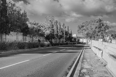 Black and White Empty Road, Paola, Malta Morning Stock Photos