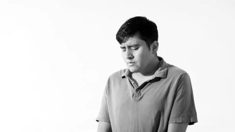 Black and white frustrated man with white background and copy space Stock Footage 217892785