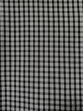Black and white gingham checkered fabric pattern texture background for textile Stock Photos