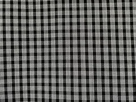 Black and white gingham checkered fabric pattern texture background for textile Stock Photos