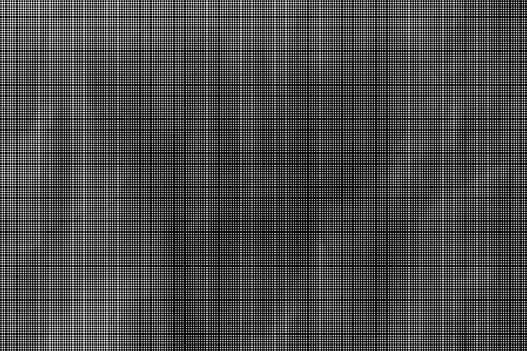 Black and white halftone dot pattern background with dense circular dots Stock Illustration