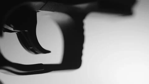 Black and White Handgun Trigger Stock Footage 138454794