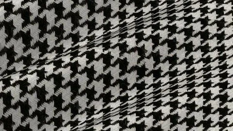 Black and White Houndstooth Tweed Fabric shifting in retro wool waves Stock Footage 337523678