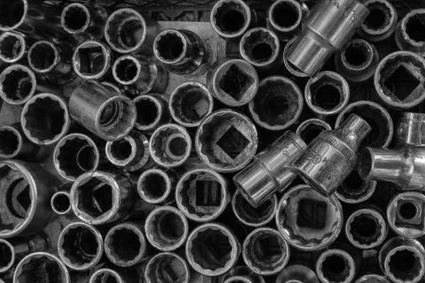 Black and white image of socket set heads, of various sizes. Stock-Fotos