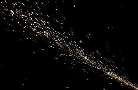 A black and white image of a starry sky with a bright light in the middle Stock Photos