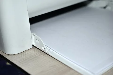 Black and white laser printer tray with paper Foto stock