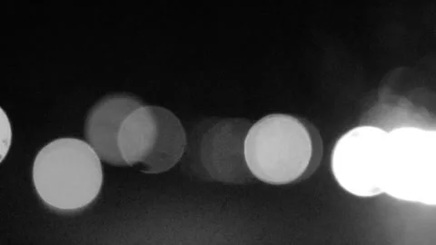 Black and white lighting effect in blur view at night Stock Footage 231012922
