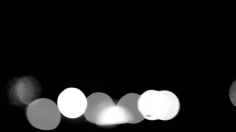 Black and white lighting effect in blur view at night Stock Footage 231012930