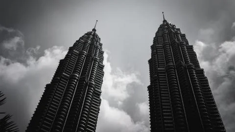 The black and white low angle view of the Petronas Twin Towers or KLCC. Stock Photos