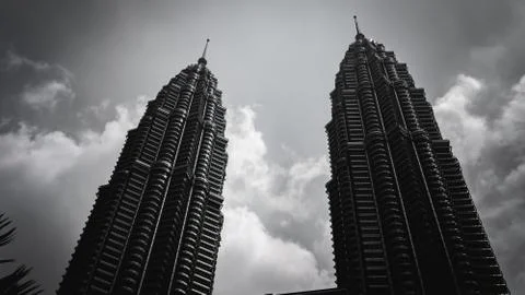 The black and white low angle view of the Petronas Twin Towers or KLCC. Stock Photos