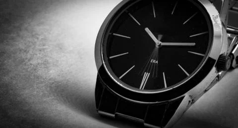 Black and white macro photo of second hand movement of a wrist clock Stock Photos