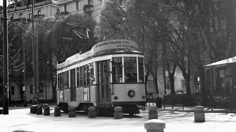 Black and white: MILAN, ITALY- MARCH 22, 2016: Old vintage yellow tram №1881 Stock Footage