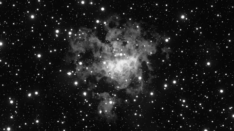 Black and white nebula background, loopable. Starry colorful night sky with Stock Footage 252751694