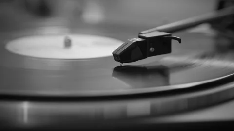 Black and White. The needle rises from a vintage vinyl record. The vinyl record Stock Footage 146790706