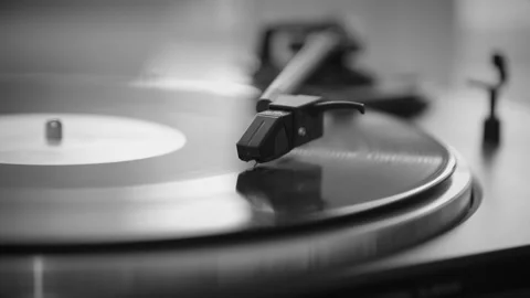 Black and White. The needle rises from a vintage vinyl record. The vinyl record Stock Footage 146790978