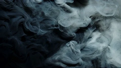 Black and white paint splash each other in water against a black background Stock Footage 236073591