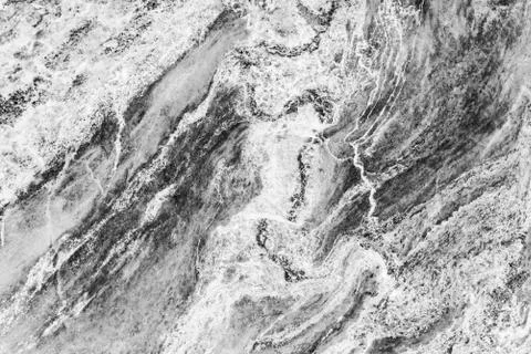 Black and white pattern texture on old marble. Abstract background. Stock Photos