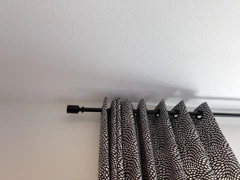 Black and White Patterned Curtains with Rod Stock Photos