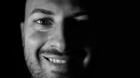 Black and white Portrait, closeup caucasian boy with eyes smiling looking Stock Footage 145449000