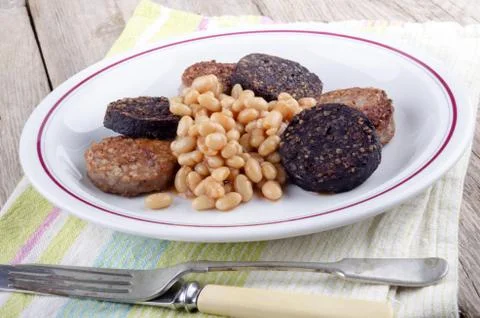 Black and white pudding with beans Stock Photos