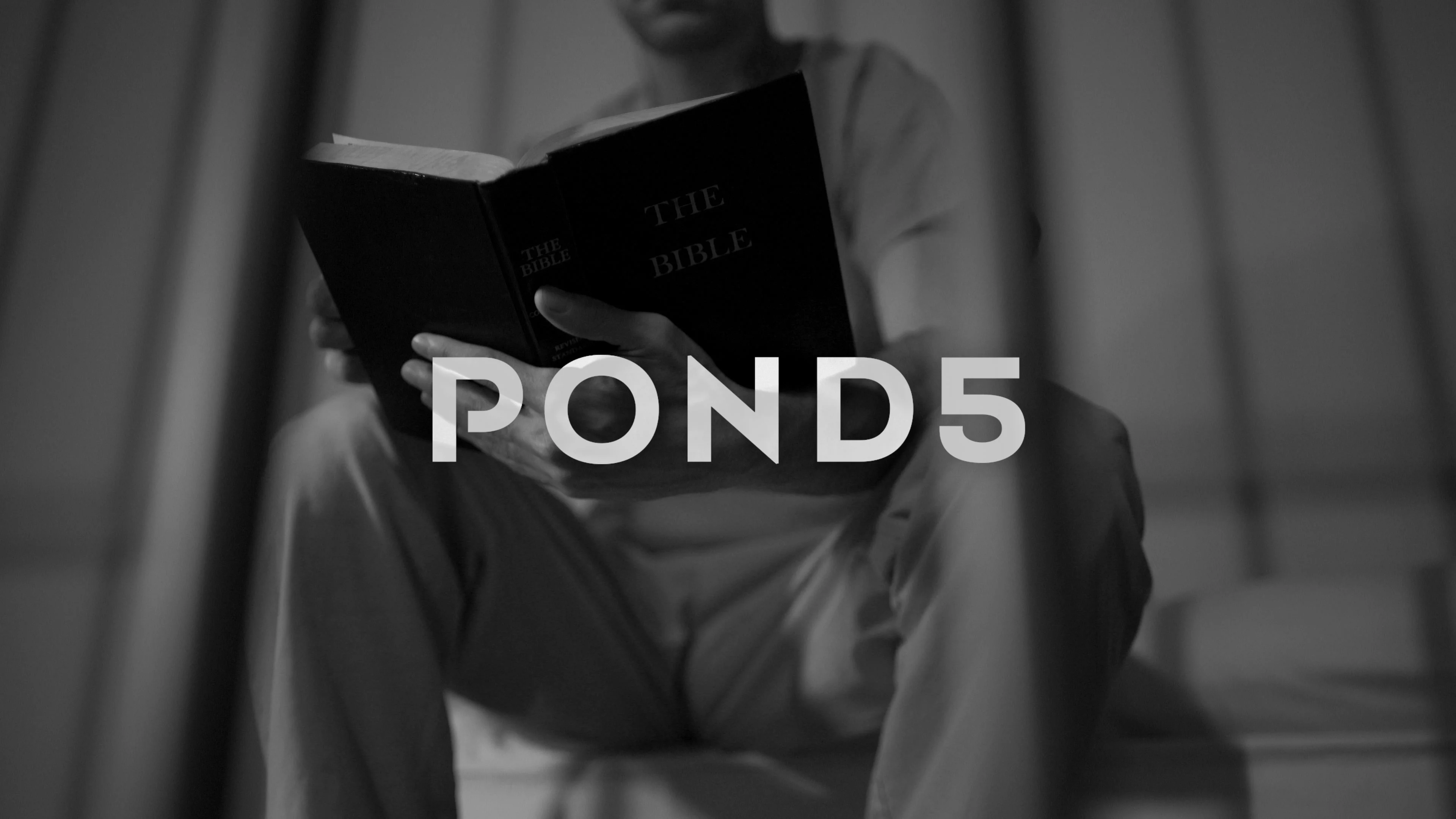 Black and white scene of a bible reading... | Stock Video | Pond5