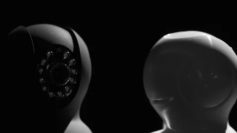 Black and white security cameras spinning after light on Stock Footage