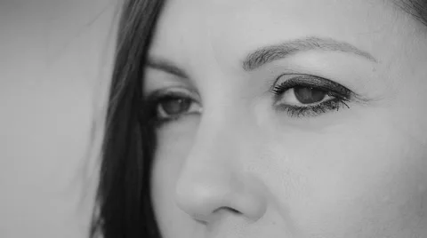 Black and white slow motion closeup footage on a young woman eyes Stock Footage 67945019