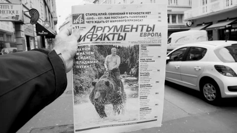 Black and white slow motion  Argumenty i Fakty Russian press featuring Vladimir Stock Footage 87224620
