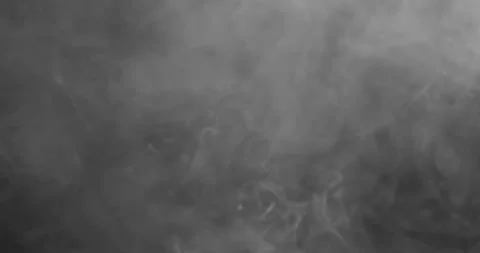 Black and white smoke explosion slowly floating through space against black Stockbeeldmateriaal 328823678