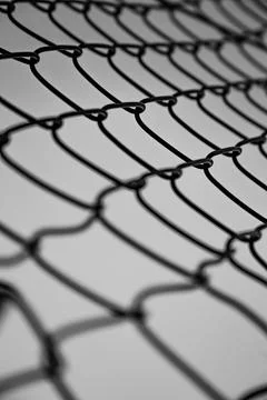 Black and white super close up of a net or a fence with copy space Stock Photos