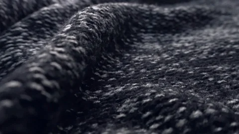 Black and white texture of a knitted sweater. Close-up. Stock Footage 111564764