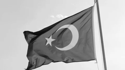 Black and white timelapse perspective far video shot of colorful waving turki Stock Footage 92015943