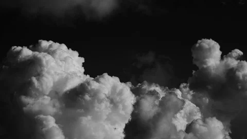 Black and white timelpase cloud. White clouds on black background time Stock Footage 123498497