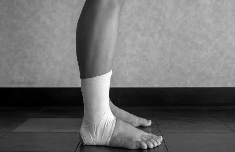 Black and white version of Side view of an Ankle tape job Stock Photos