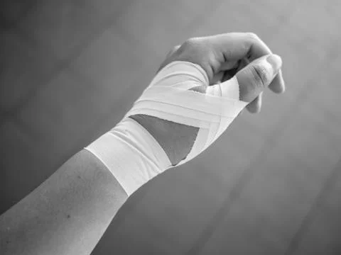 Black and white version of Thumb tape job for a thumb sprain Stock Photos