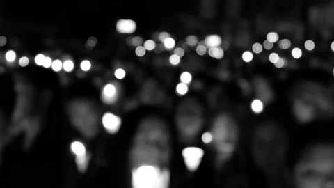Black and white video of crowd people dress in black, lighting candles for mourn Stock Footage 237454997