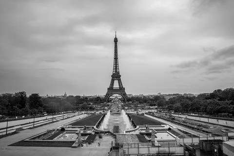 A black and white view of the Eiffel Tower in Paris, France. The tower is Stock Photos