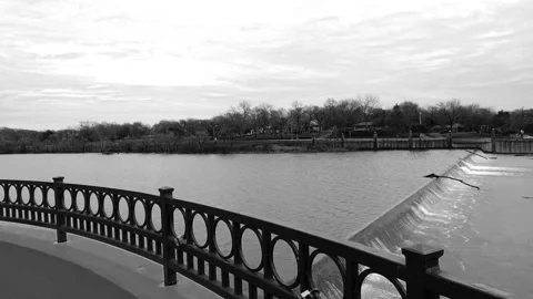 Black and White Water Fall at Dam White Rock Lake Texas Stock Footage 271136730