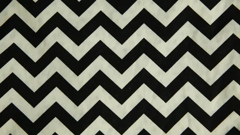 Black and white Zig zag seamless fabric pattern, Backgrounds Video stock 128472482