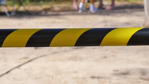 Black and yellow caution tape Stock Footage 345536475