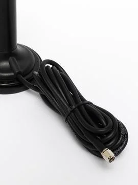Black antenna with long coiled cable variant Stock Photos