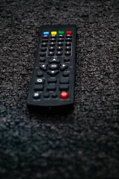 Black appliances remote control showcasing sleek design Stock Photos