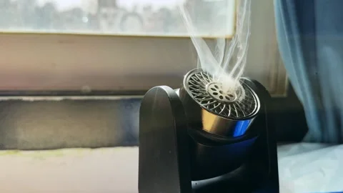 Black Aroma Diffuser Emitting Vapor By Window Stock Footage 346086828