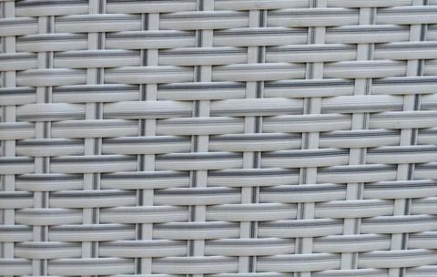 Black artificial rattan pattern. Background of basket structure close-up. Fur 写真素材