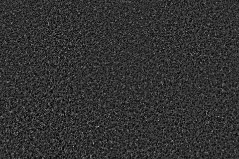 Black asphalt texture background. Фото