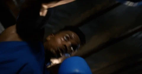 Black athlete practices boxing, closeup seen from below 2 Stock Footage 83202268