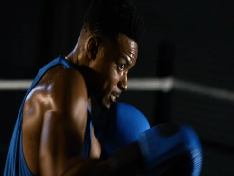 A black athlete practices shadowboxing, closeup Stock Footage 83328151