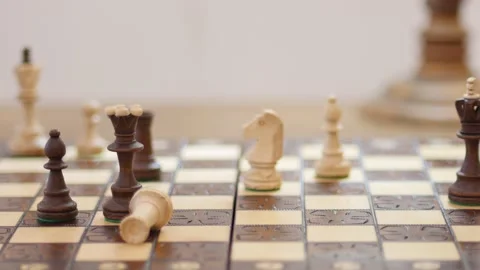 Black attacking and taking white rook. chess game. Business, competition, Stock Footage 146228454
